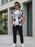 THE COASTAL CURVE SIGNATURE PALM SHIRT